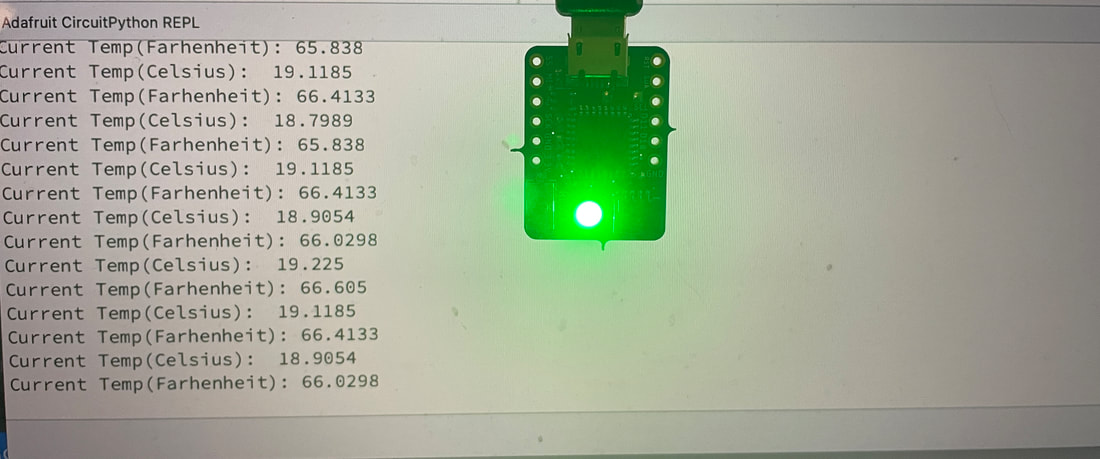 CP Sapling microcontroller showing a green led color for temperatures less than 24 degrees celsius