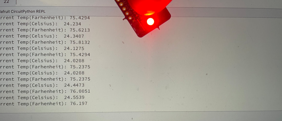 CP Sapling with red neopixel color illuminated for temperatures higher than 24 degrees celsius